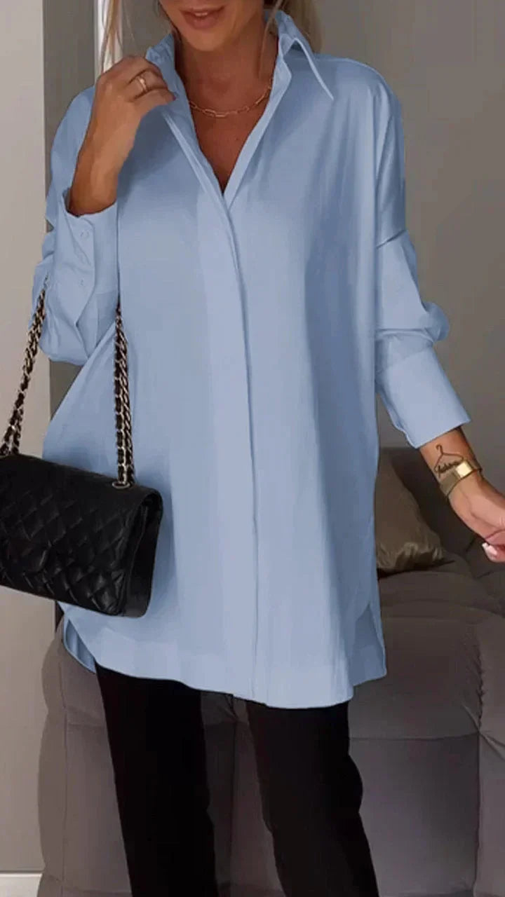 Elegant oversized skjortebluse med opsmøgede ærmer til kvinder
