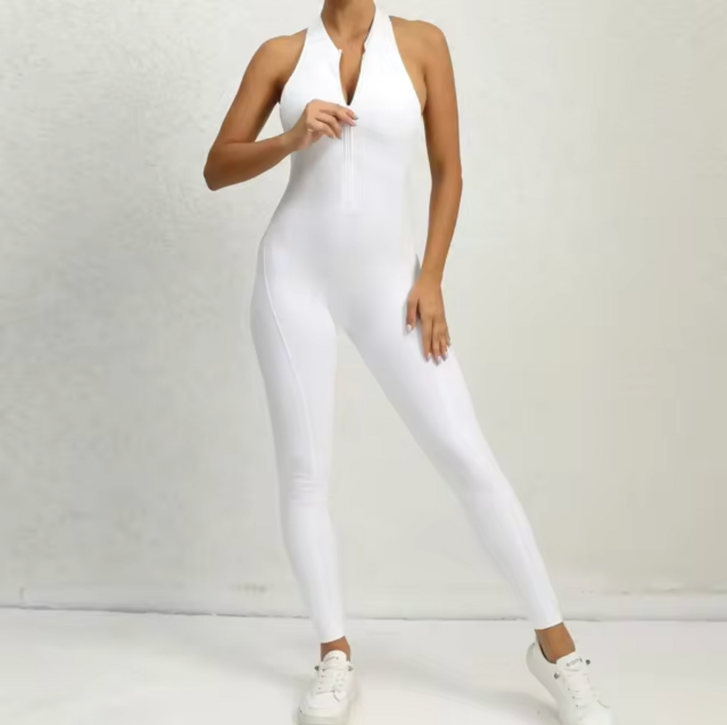 Fitness-jumpsuit med lynlås til kvinder