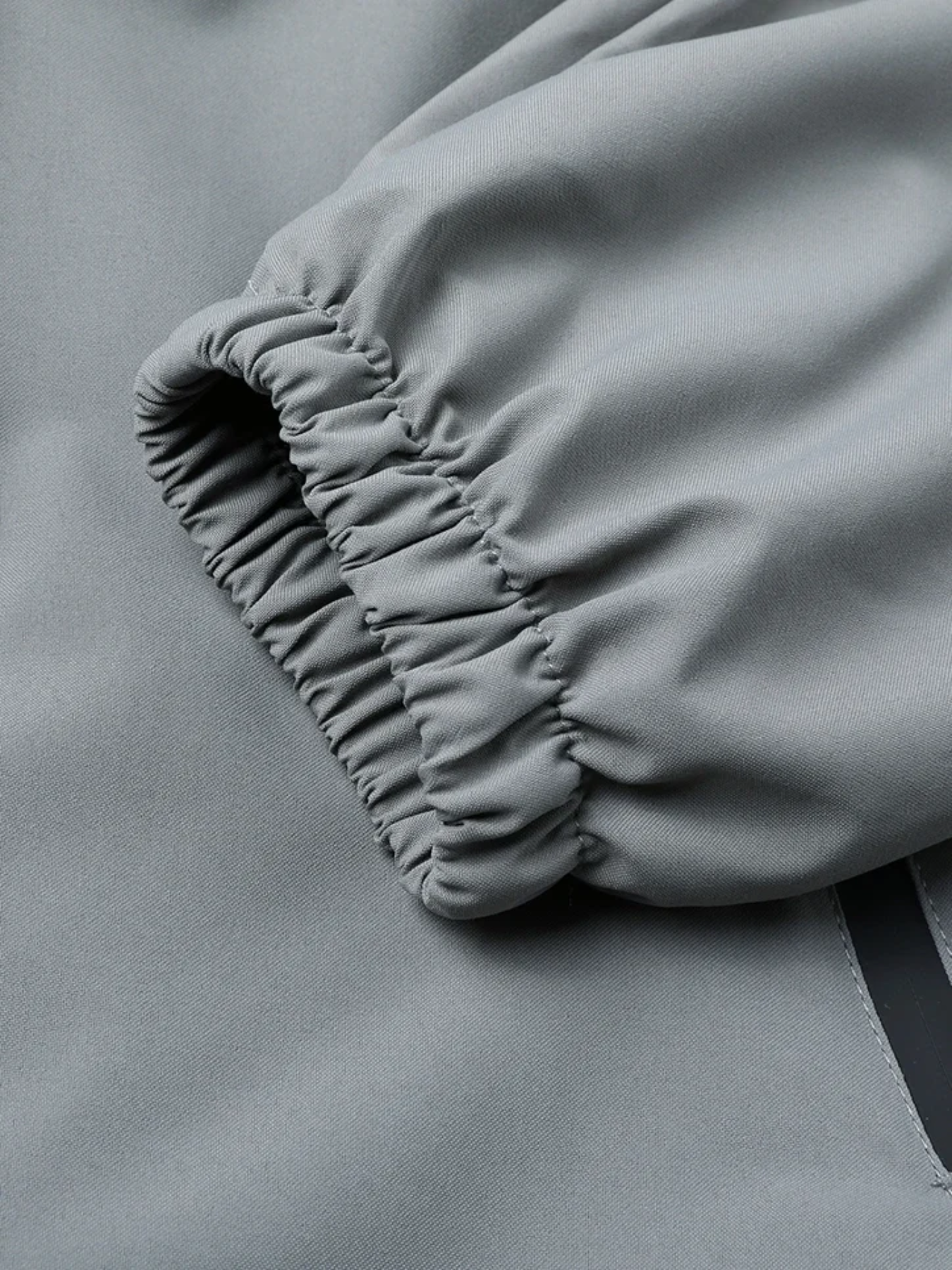 Vandtæt åndbar mackintosh til mænd med justerbar hætte