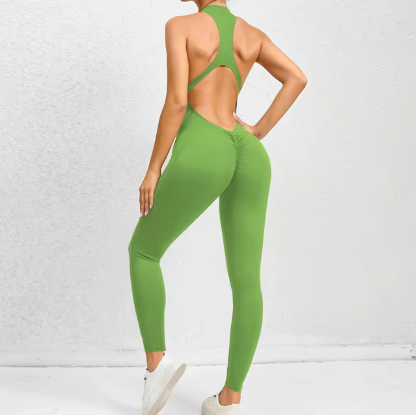Fitness-jumpsuit med lynlås til kvinder