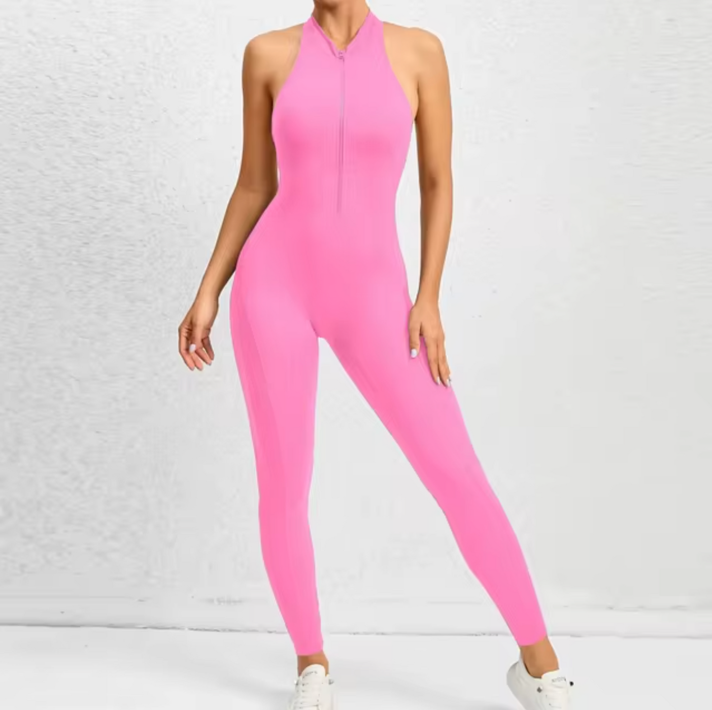 Fitness-jumpsuit med lynlås til kvinder