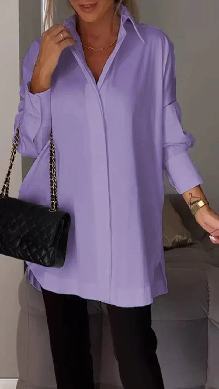 Elegant oversized skjortebluse med opsmøgede ærmer til kvinder