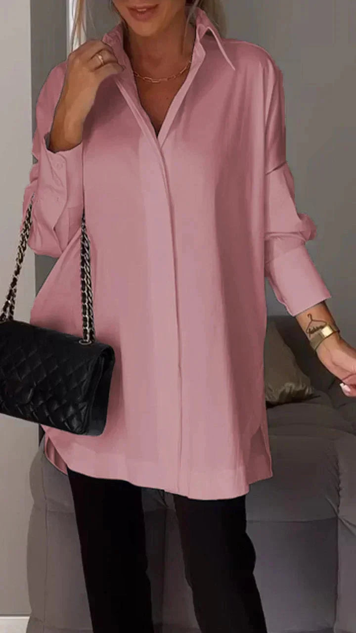 Elegant oversized skjortebluse med opsmøgede ærmer til kvinder