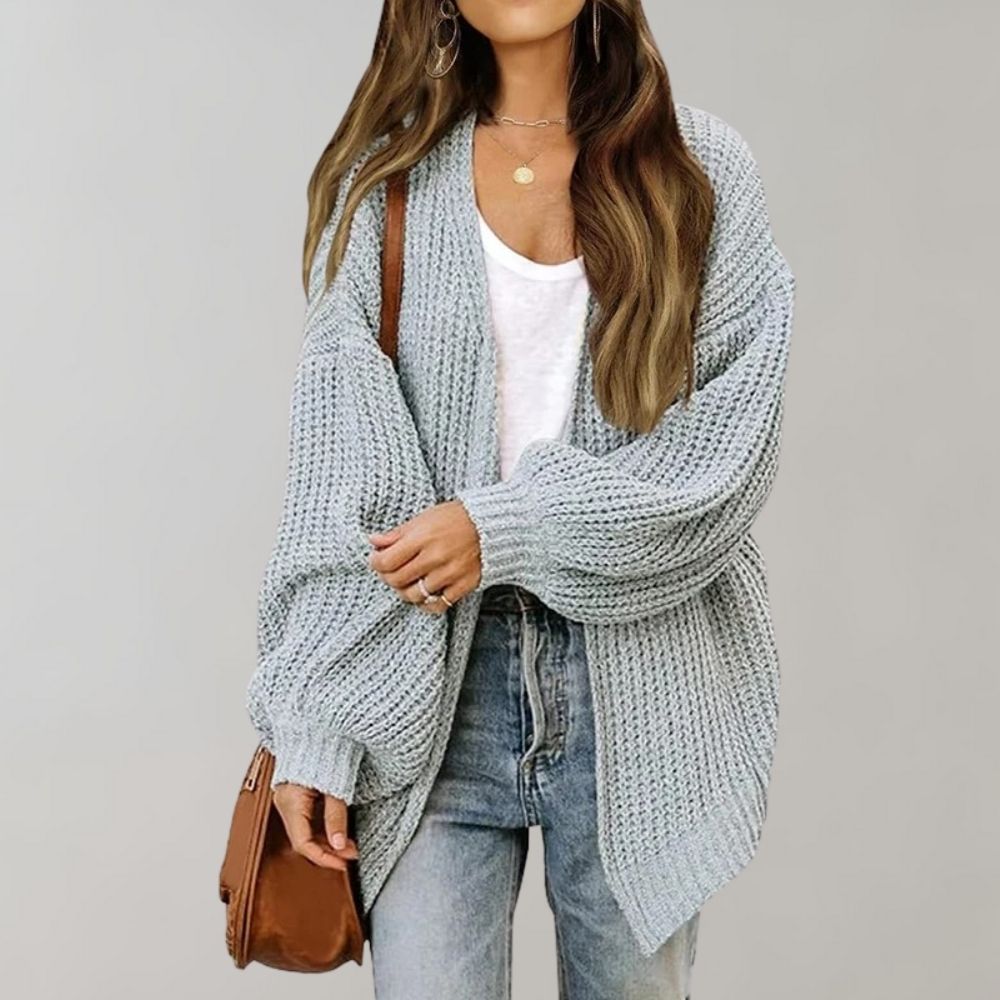 Løs tyk strikket sweater-frakke