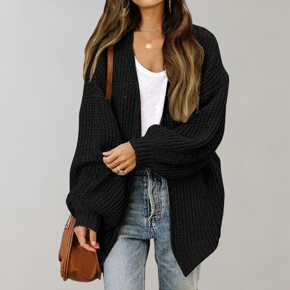 Løs tyk strikket sweater-frakke