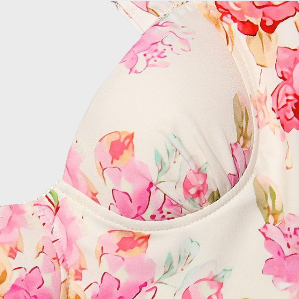 Blomstret og udslået midikjole