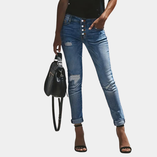 Blå denimjeans med slidser og huller