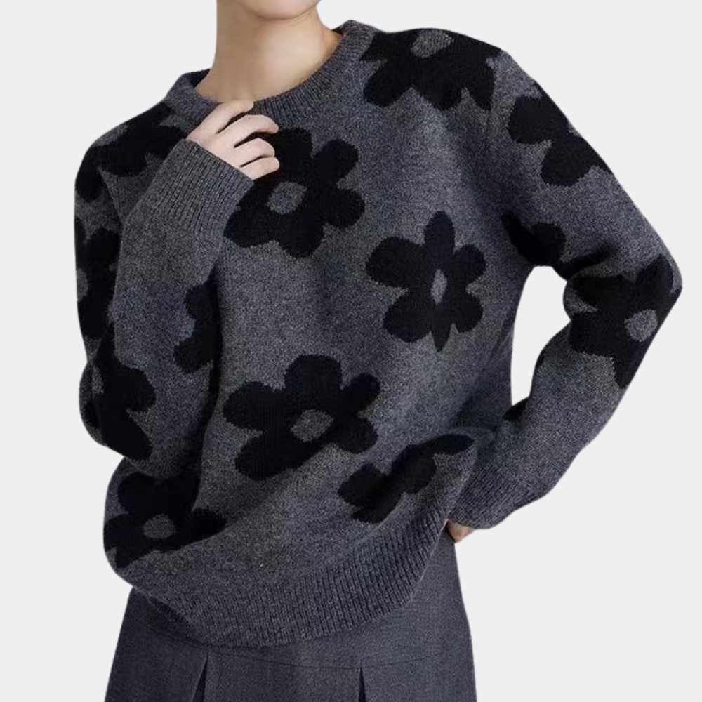 Strikket sweater med stiliserede blomster