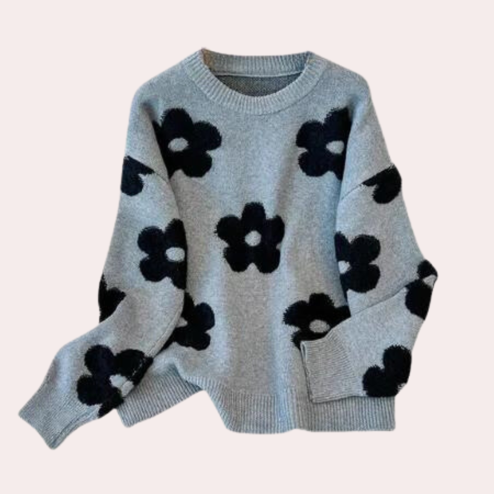 Strikket sweater med stiliserede blomster