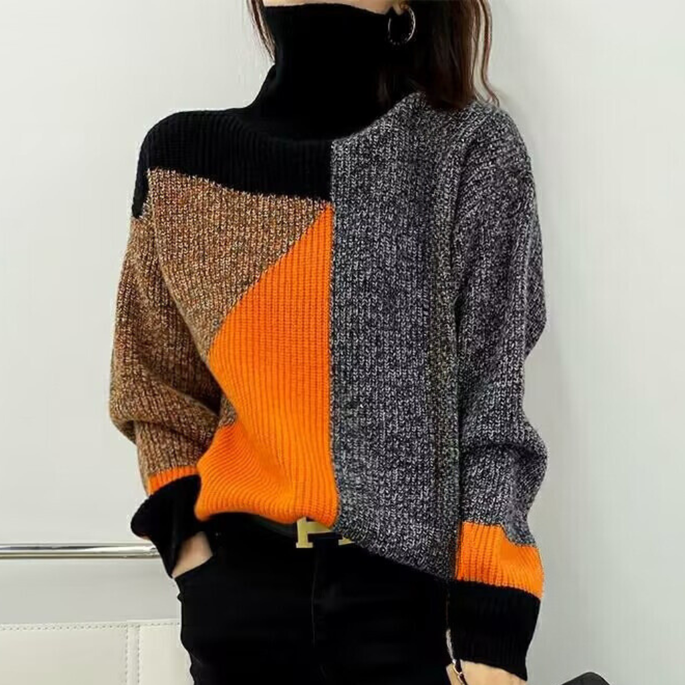 Rullekravesweater i geometriske farver