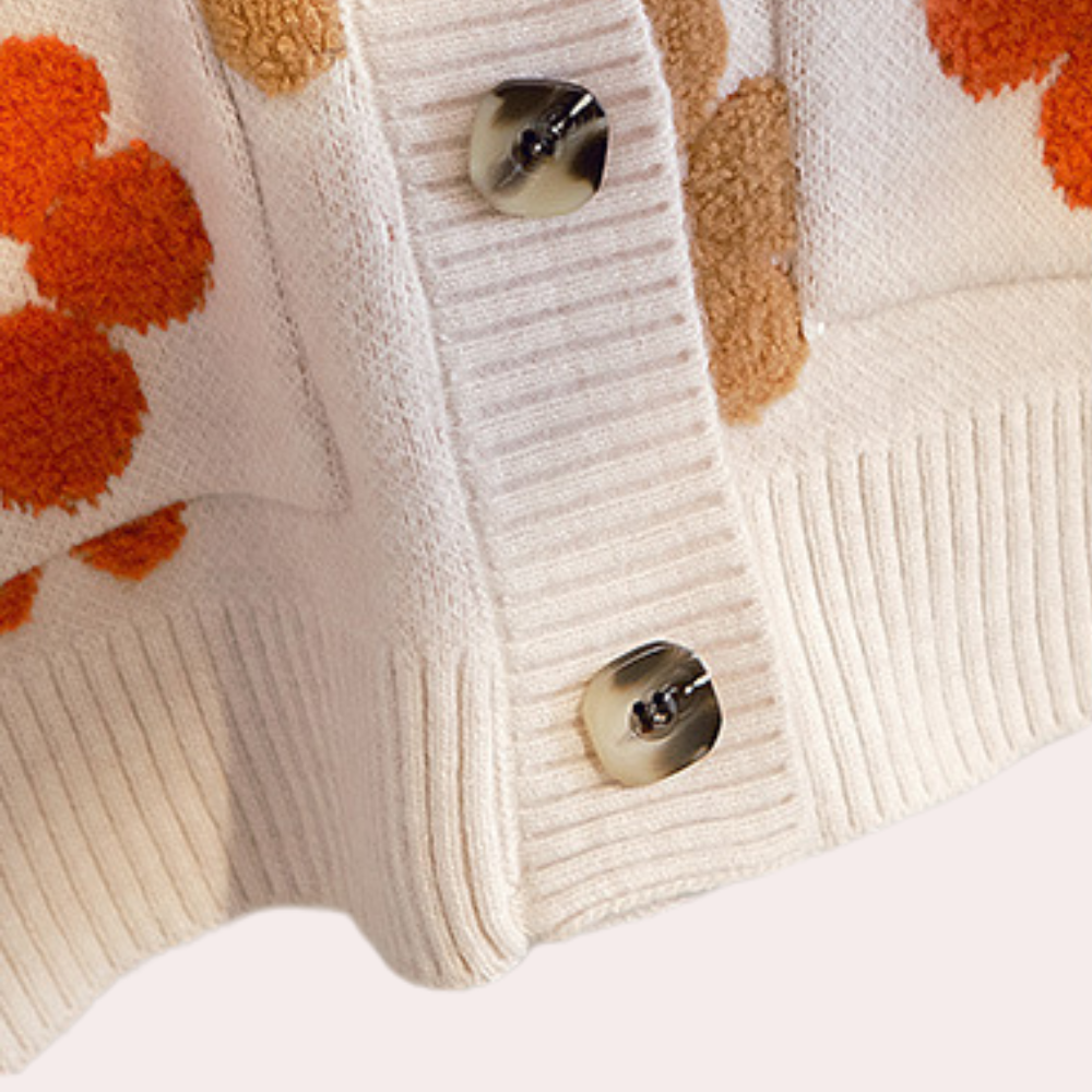 Sød blomsterstrikket sweater