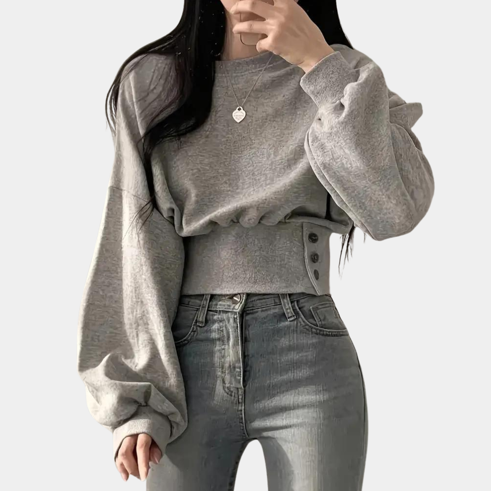 Sweater med pufærmer og knapper i taljen