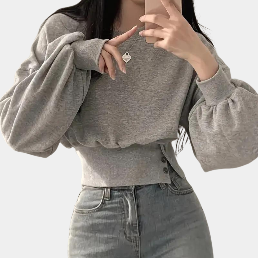 Sweater med pufærmer og knapper i taljen
