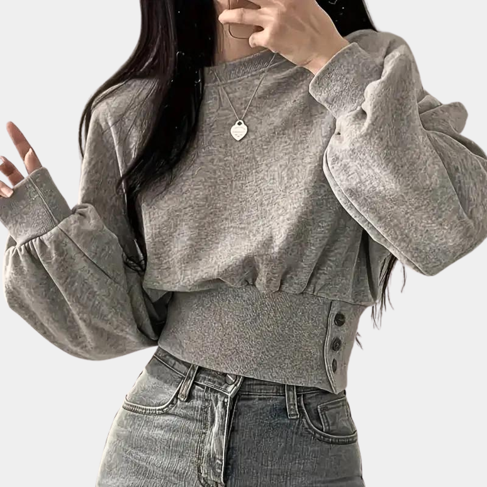 Sweater med pufærmer og knapper i taljen