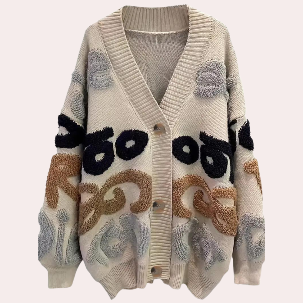 Løs strikket cardigan med åbne masker
