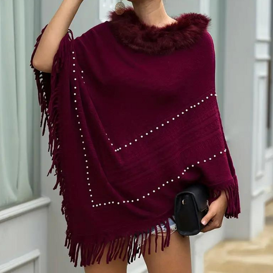 Vinterstrikket poncho med kvaster