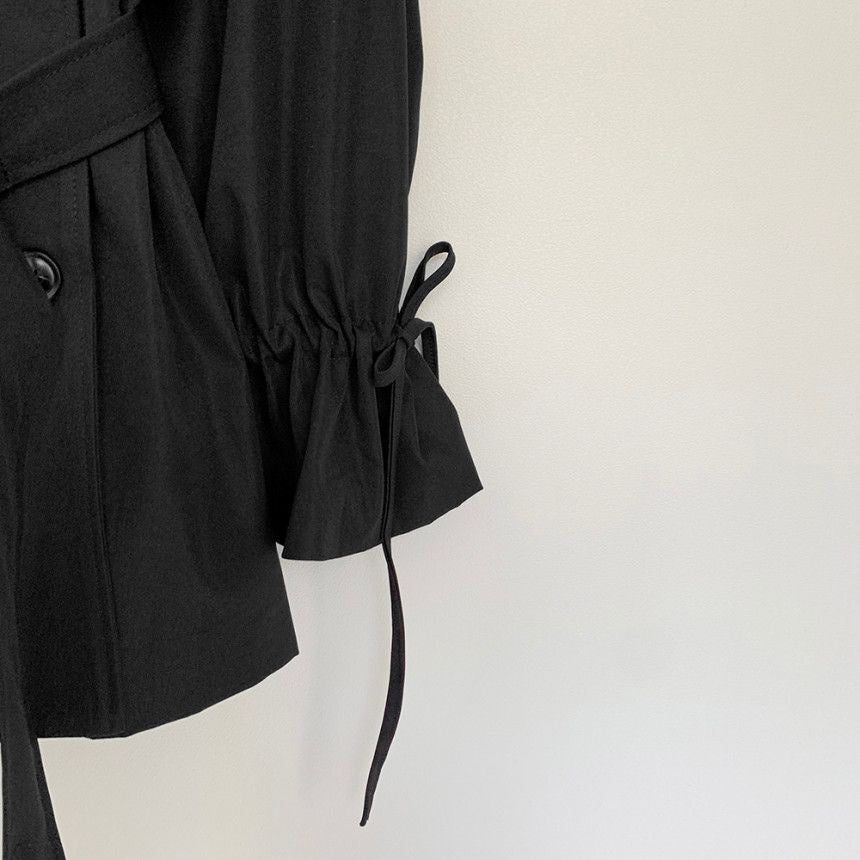 Løs frakke med hakket krave og skærf til kvinder