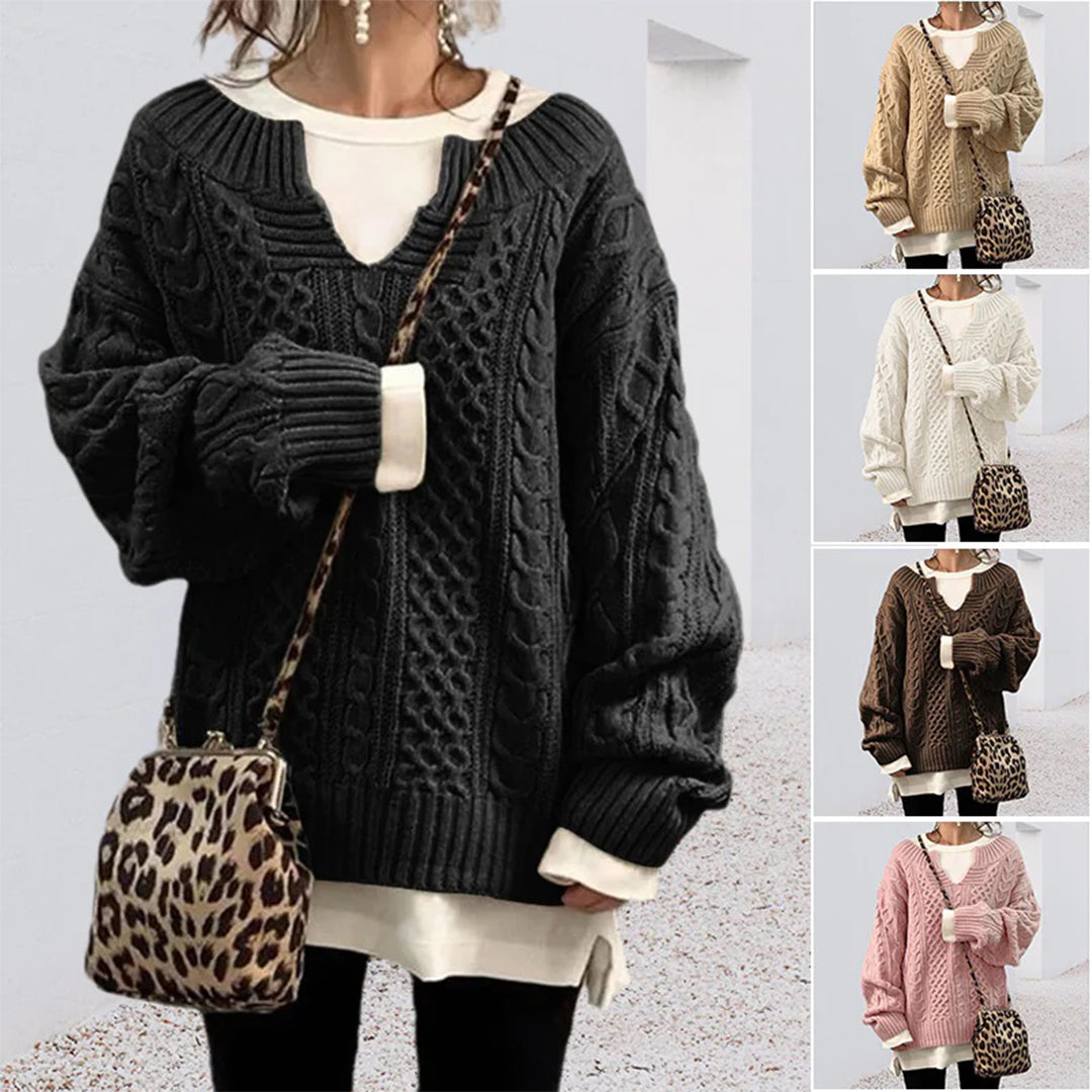 Strikket sweater med snoet kabelmønster