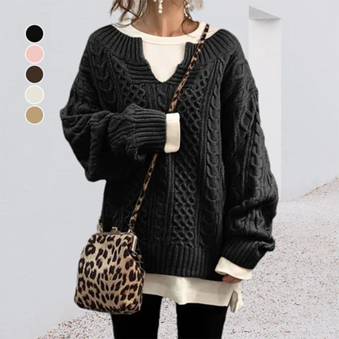 Strikket sweater med snoet kabelmønster