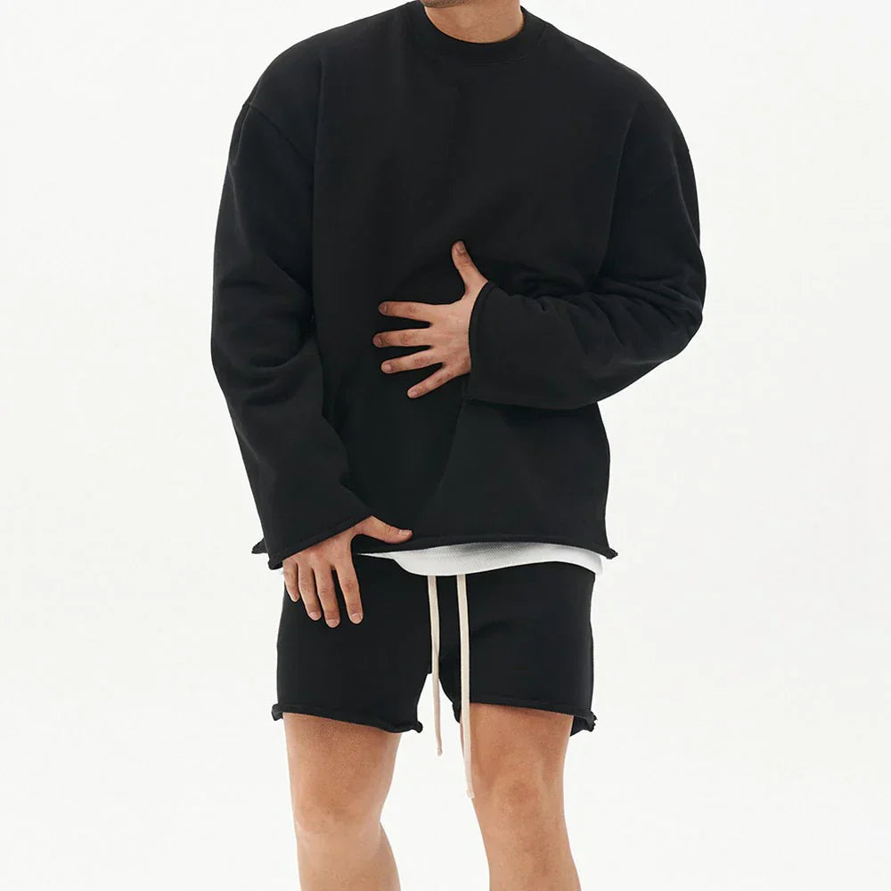 Sporty 2-delt sæt med langærmet top og shorts til mænd
