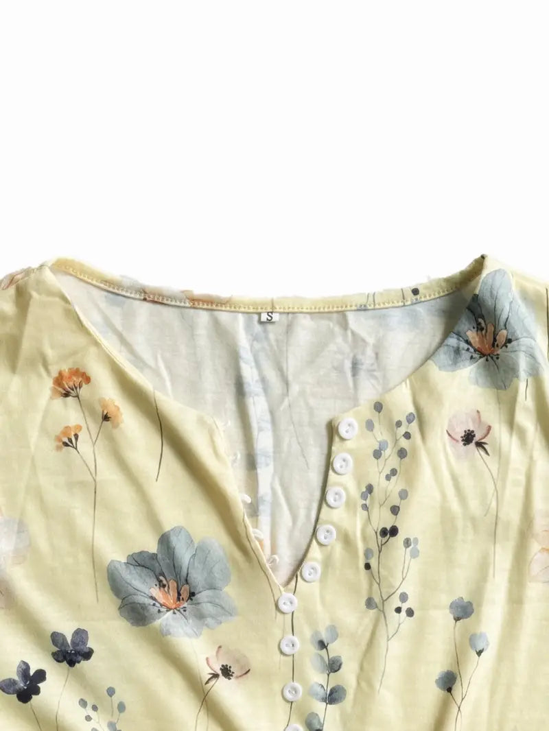 Top med blomstermønster, knapper og klokkeærmer til kvinder