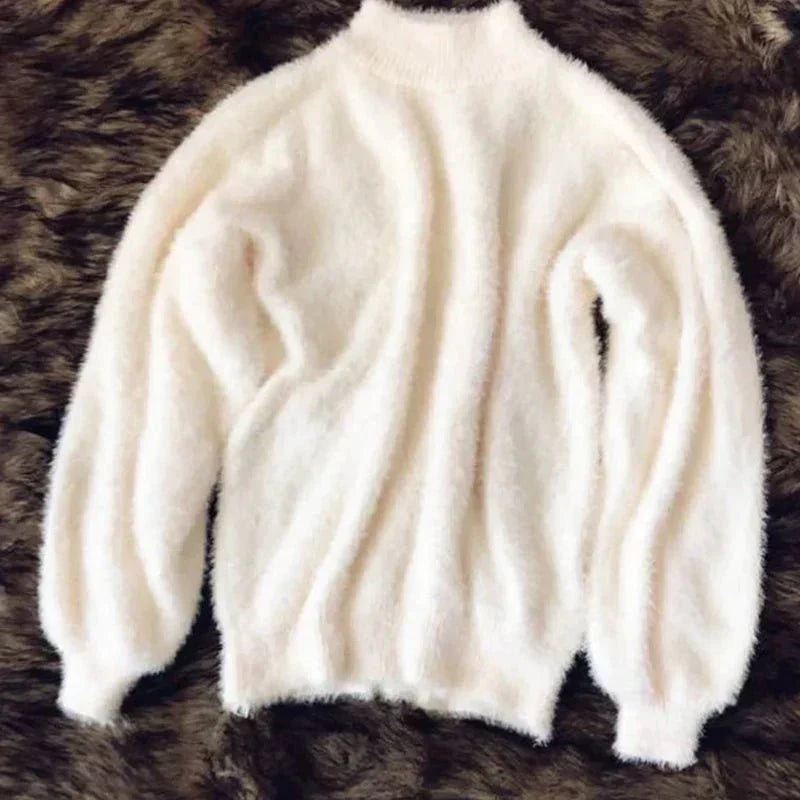 Fluffy strikket sweater til kvinder