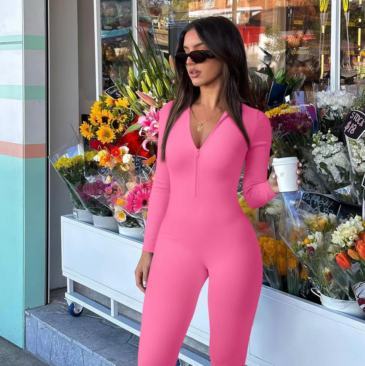 Figursyet jumpsuit med lynlås foran til kvinder