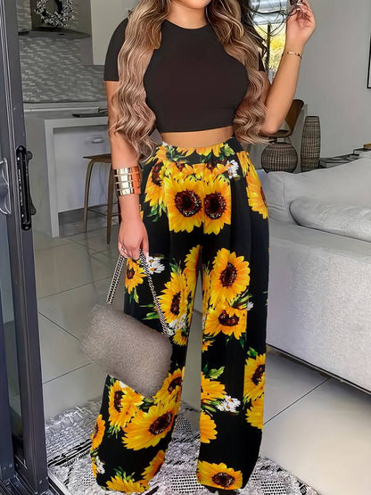 Sommersæt cropped t-shirt og blomstrede bukser til kvinder