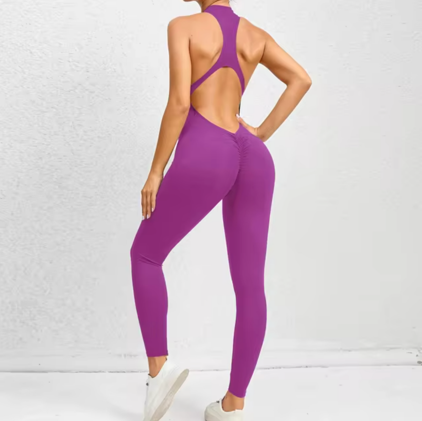Fitness-jumpsuit med lynlås til kvinder
