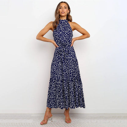 Elegant midikjole med halterneck og prikker