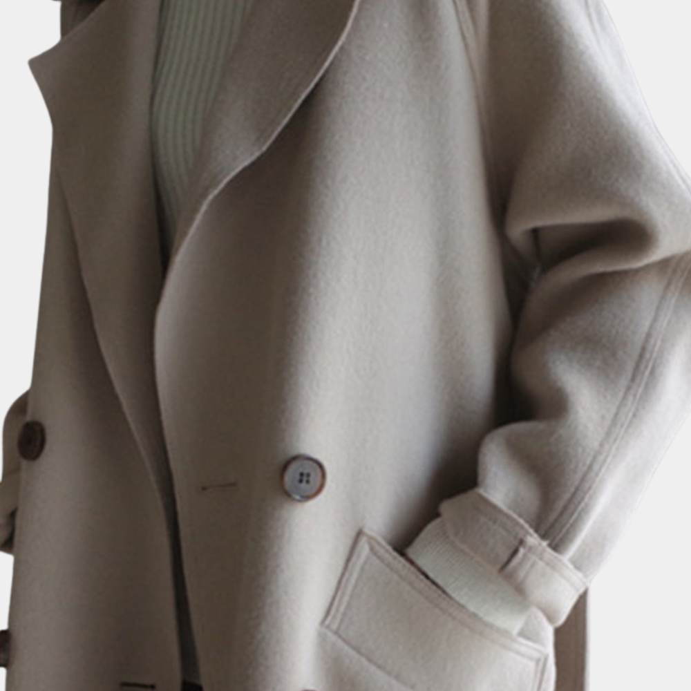 Vendbar lang uldfrakke