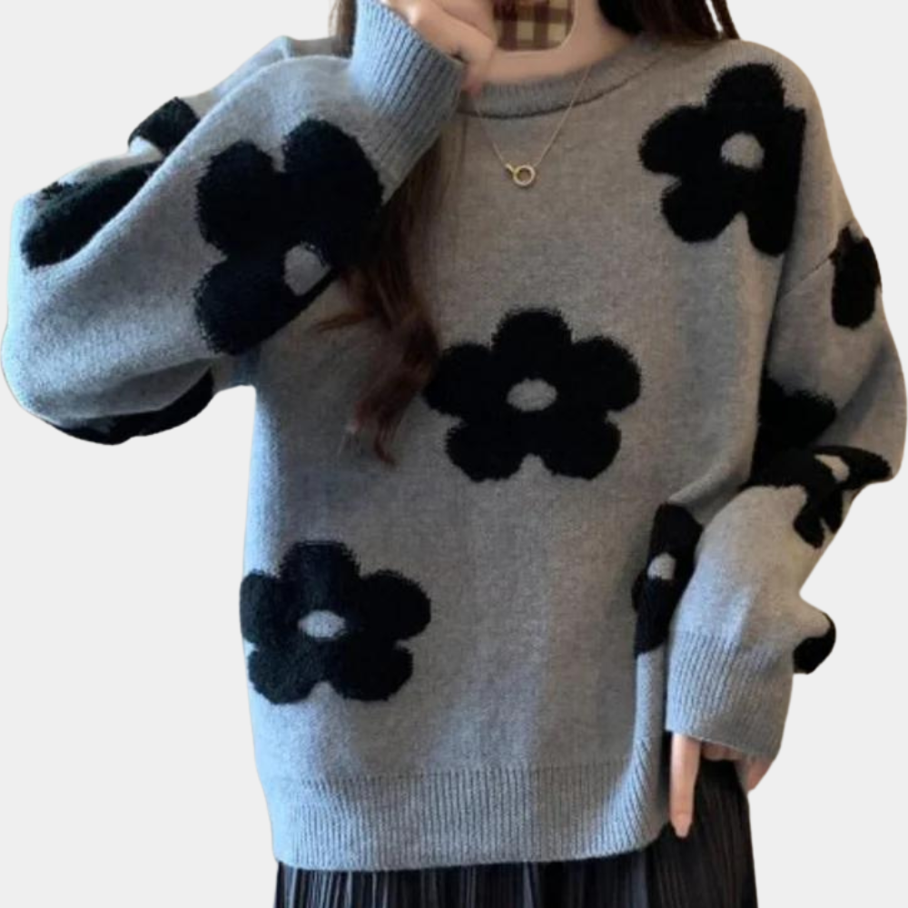 Strikket sweater med stiliserede blomster