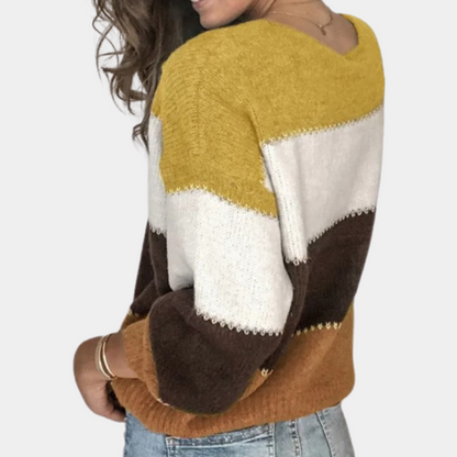 Jordfarvet sweater med stingdetaljer