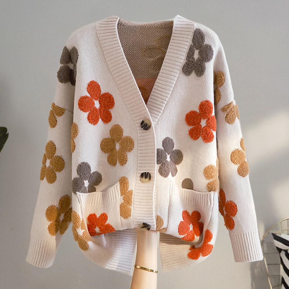 Sød blomsterstrikket sweater