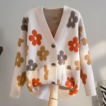 Sød blomsterstrikket sweater