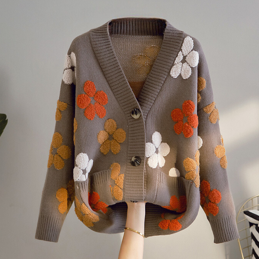 Sød blomsterstrikket sweater