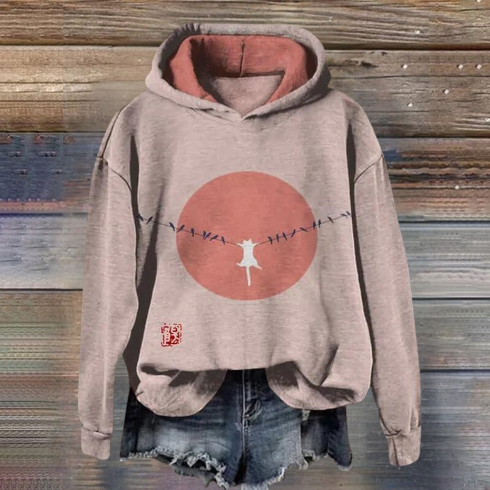 Stilfuld dametrøje med poppet dyreprint