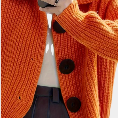 Orange sweater-top med store knapper