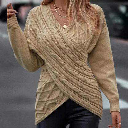 Strikket sweater med kryds og bolle