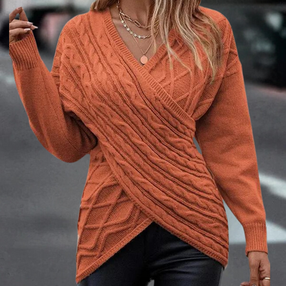 Strikket sweater med kryds og bolle