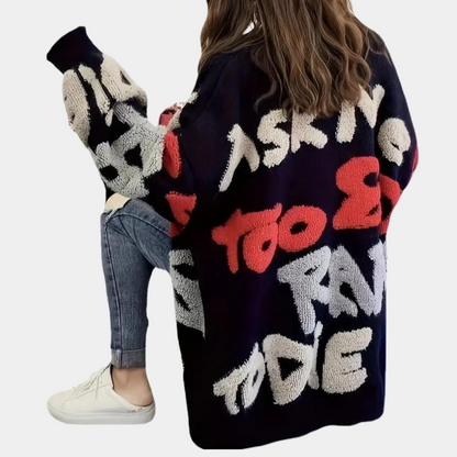 Løs strikket cardigan med åbne masker