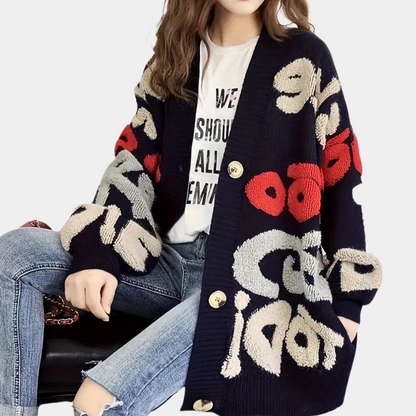 Løs strikket cardigan med åbne masker