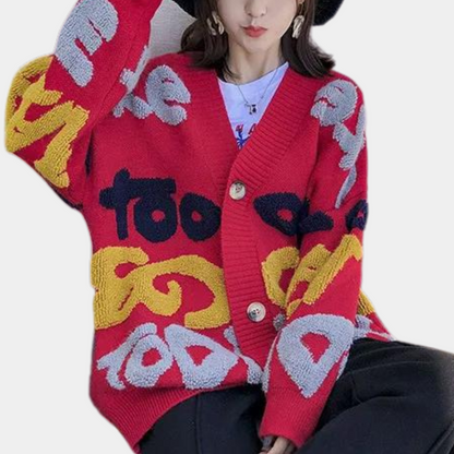 Løs strikket cardigan med åbne masker