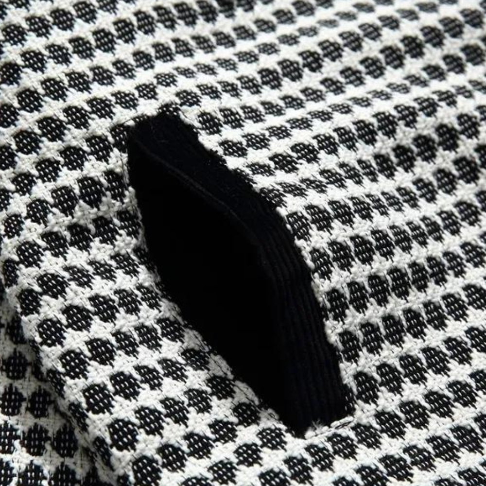 Sort og hvid langærmet polo