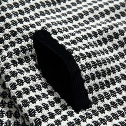 Sort og hvid langærmet polo