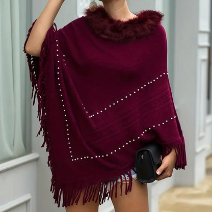 Vinterstrikket poncho med kvaster