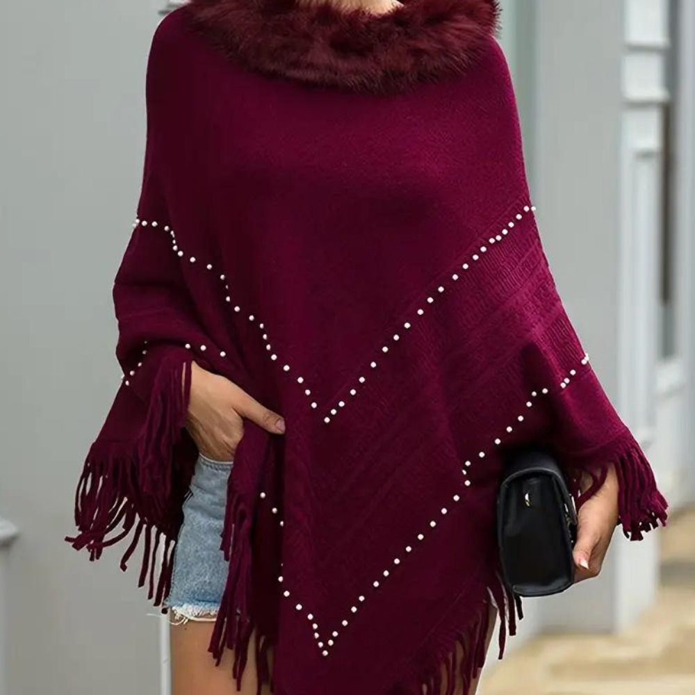 Vinterstrikket poncho med kvaster