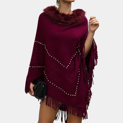 Vinterstrikket poncho med kvaster