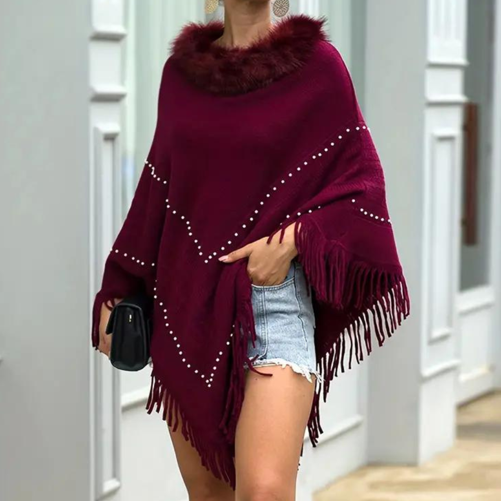 Vinterstrikket poncho med kvaster