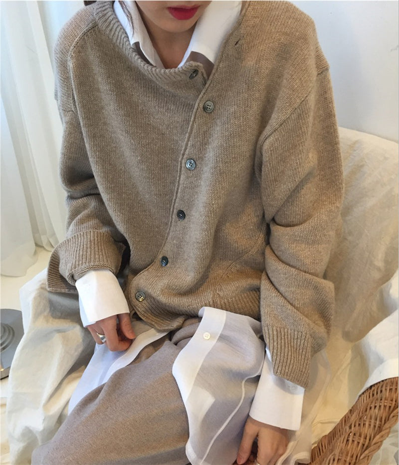 Cardigan i kashmir med knaplukning